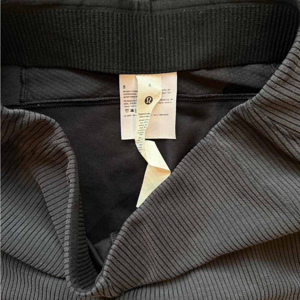 Like New Lululemon Athletica Ribbed Softstreme Flared Leg Pant, Black/Dk. Gray 8 - Picture 9 of 13